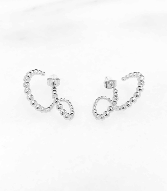 Boucles d'oreilles effet double créole en acier 316L de haute qualité.